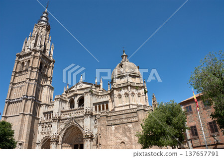 Gothic tower of Toledo Cathedral in summer light 137657791
