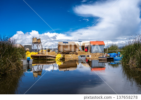 Floating island "Uros Titino" on Lake Titicaca in Peru Floating island "Uros Titino" on Lake Titicaca in Peru 137658278