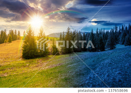 mountain scenery with coniferous forest. day meet night. sun and moon over countryside landscape with grassy fields and rolling hills. springtime rural area under cloudy sky. epic outdoor adventure mountain scenery with coniferous forest. day meet night. sun and moon over countryside landscape with grassy fields and rolling hills. springtime rural area under cloudy sky. epic outdoor adventure 137658696