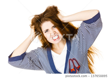 Attractive woman having angry frustrated face expression Attractive woman having angry frustrated face expression 137658895