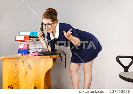 Happy secretary business woman in office Happy secretary business woman in office 137658926