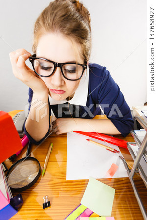 Sleepy business woman in office working Sleepy business woman in office working 137658927