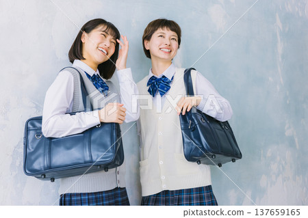Smiling, close-knit high school girls Smiling, close-knit high school girls 137659165