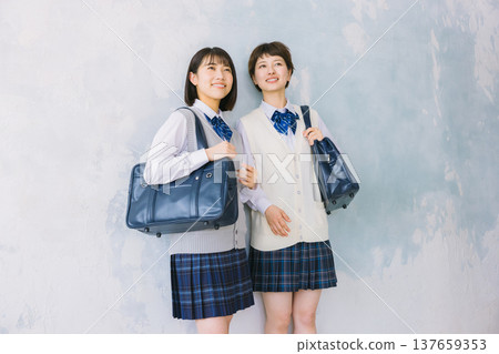 Smiling, close-knit high school girls Smiling, close-knit high school girls 137659353