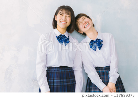 Smiling, close-knit high school girls 137659373