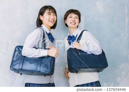 Smiling, close-knit high school girls 137659446