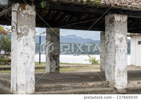 Historic fish market arches framing the bay and mountains Historic fish market arches framing the bay and mountains 137660030