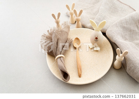 Zero waste Easter. Easter table setting with rustic bunny decorations 137662031