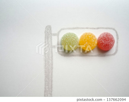 Traffic lights made with colorful candies and crayons 137662094