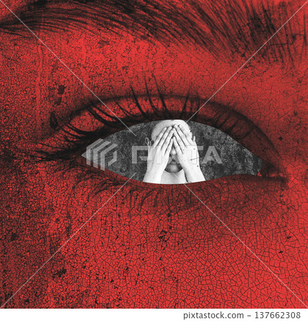 Large red textured eye observing man covering face 137662308