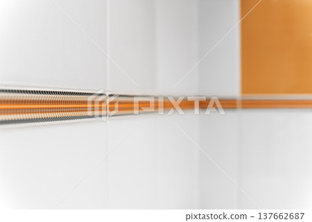 Bathroom ceramic wall tile with decorative border detail Bathroom ceramic wall tile with decorative border detail 137662687