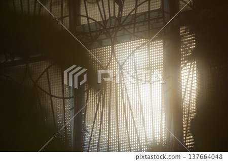 Close-up of the silhouette of light behind Taiwan's iron bars 137664048