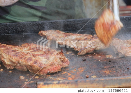 Steak baked on the barbecue Steak baked on the barbecue 137666421