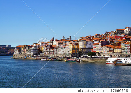 The Douro River and the cityscape of the Ribeira district in Porto, Portugal The Douro River and the cityscape of the Ribeira district in Porto, Portugal 137666738