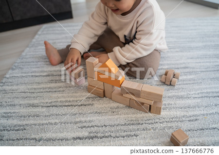 Baby playing with building blocks Baby playing with building blocks 137666776
