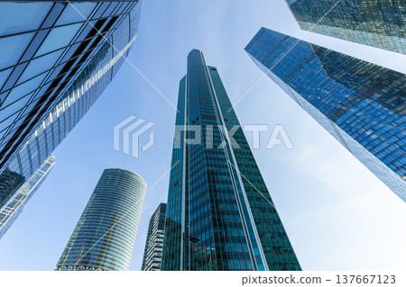 Modern glass skyscrapers on a clear day. Business center of a big city 137667123