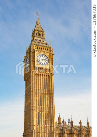 London's Big Ben and the Palace of Westminster, shining in the twilight. 137667339