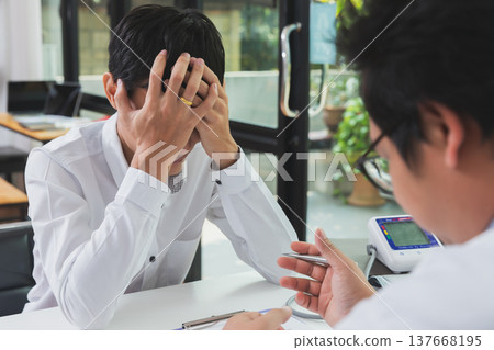 Patient man with depression crying during psychotherapy session. 137668195