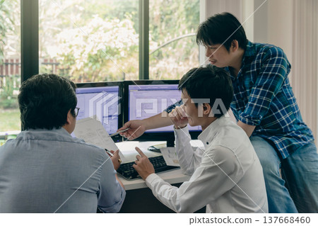 Programmers team working in a software developing. Developing programming and coding technologies. Website design. Cyber space concept. 137668460