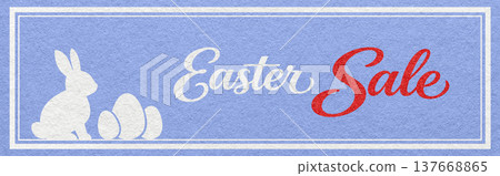 Easter sale website header banner with bunny and eggs silhouette on pastel blue textured paper background with calligraphy lettering 137668865