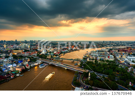Bangkok city with Chao Phraya River and Memorial Bridge in the sunset Bangkok city with Chao Phraya River and Memorial Bridge in the sunset 137670946