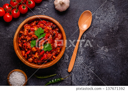 Chili Con Carne in bowl on dark background. 137671392