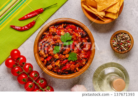 Chili Con Carne in bowl on grey background. 137671393