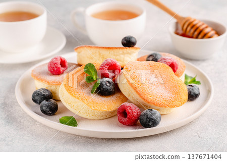 Japanese soft pancakes with berries 137671404