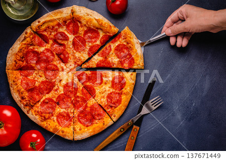 Hot homemade Pepperoni pizza 137671449