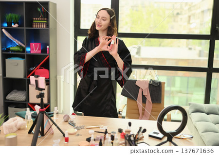 Creating beauty magic in a chic studio with vibrant colors and makeup Creating beauty magic in a chic studio with vibrant colors and makeup 137671636