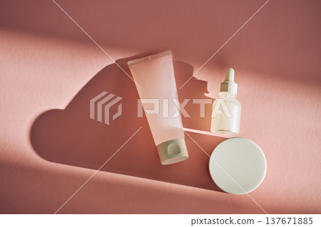 Skincare and cosmetic products displaying on pink background 137671885