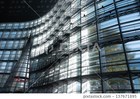 Light shining into the glass wall Light shining into the glass wall 137671895