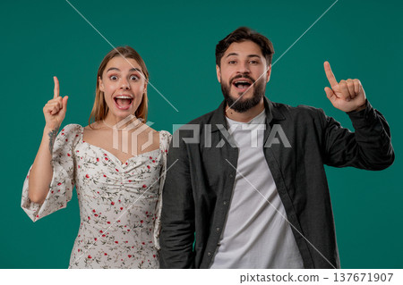 Creative Idea, Young Couple Woman and Man, Eureka Moment, Pointing Fingers Up Creative Idea, Young Couple Woman and Man, Eureka Moment, Pointing Fingers Up 137671907