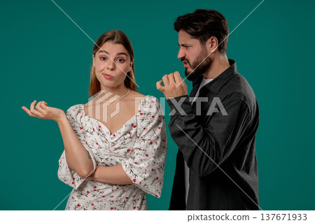 Angry Man Quarrels Wife Or Girlfriend On Green. Couple Relationships, Quarrel Angry Man Quarrels Wife Or Girlfriend On Green. Couple Relationships, Quarrel 137671933