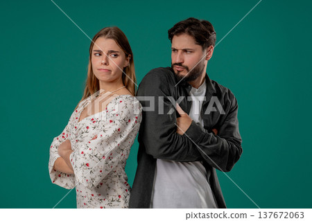 Young Offended Couple After Quarreling, Standing Back. Selfishness, Resentment Young Offended Couple After Quarreling, Standing Back. Selfishness, Resentment 137672063