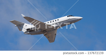 Small business jet, an airplane taking off in the air. Private jet 137672139