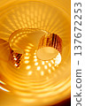 Abstract sparkling golden background with swirl energy for parties sales and awards. Festive poster background for Christmas and New Year promo. 137672253