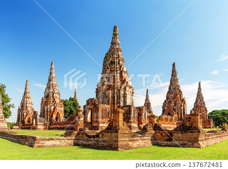 Historic Wat Chaiwatthanaram temple ruins in Ayutthaya, Thailand. Ancient Buddhist architecture and famous heritage landmark of the Ayutthaya historical park. Historic Wat Chaiwatthanaram temple ruins in Ayutthaya, Thailand. Ancient Buddhist architecture and famous heritage landmark of the Ayutthaya historical park. 137672481