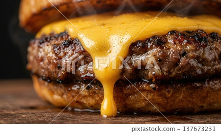 Extreme Macro of Melted Cheddar Cheese Dripping Down Burger Patty Extreme Macro of Melted Cheddar Cheese Dripping Down Burger Patty 137673231