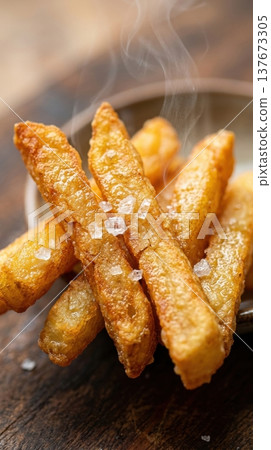 Extreme Macro of Golden French Fries with Sea Salt Crystals 137673305