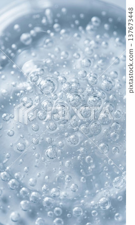 Transparent Hyaluronic Hair Serum Gel with Suspended Bubbles Macro 137673448