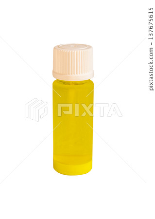 Laboratory plastic vial with bright yellow liquid chemical sample 137675615