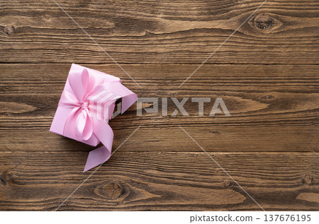 Pink gift box with ribbon Pink gift box with ribbon 137676195