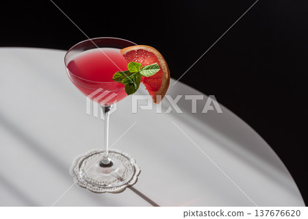 Martini Fiero Cocktail with Grapefruit and Mint. Vibrant Aperitif 137676620