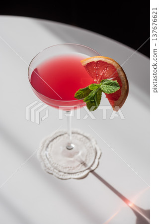 Martini Fiero Cocktail with Grapefruit and Mint. Vibrant Aperitif 137676621
