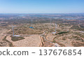 Wind green energy. Wind energy generators stand tall in a vast landscape, showcasing ecological energy solutions for a sustainable future in renewable electricity 137676854