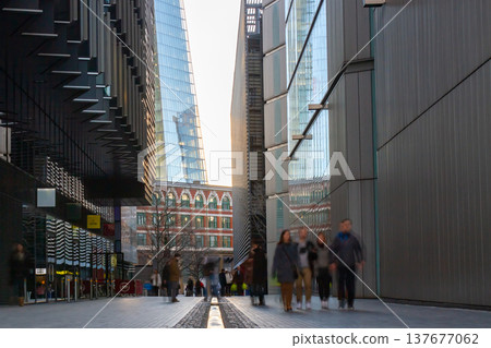 A London street corner and crowd at dusk A London street corner and crowd at dusk 137677062