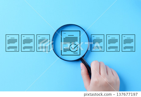 Document review process and quality control concept. Hand holding magnifying glass over a document icon with checklist, Document review and approval. Certificate management, Audit, Standardization, Document review process and quality control concept. Hand holding magnifying glass over a document icon with checklist, Document review and approval. Certificate management, Audit, Standardization, 137677197