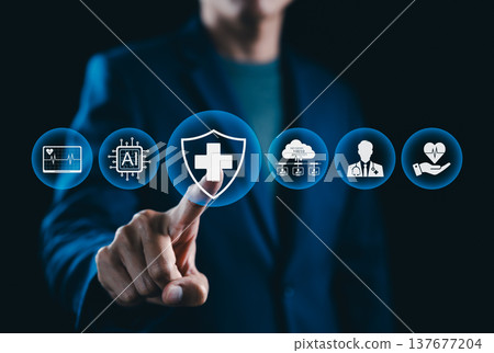 AI driven healthcare and medical technology concept. Businessman touches digital shield with medical cross icon representing healthcare protection, AI health data, telemedicine network, smart hospital 137677204