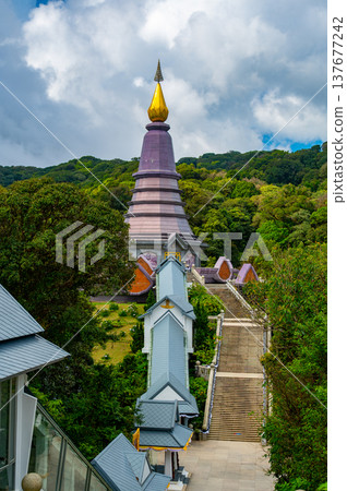 Queen Pagoda Naphaphonphumisiri at Doi Inthanon National Park Thailand. Royal stupa built in 1992 for Queen Sirikit, surrounded by gardens and mountain views near the highest peak of Thailand. 137677242